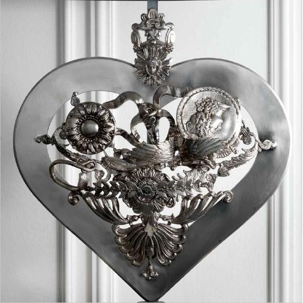 Pretty silver metal table lamp with decorative heart and red shade from Italy
