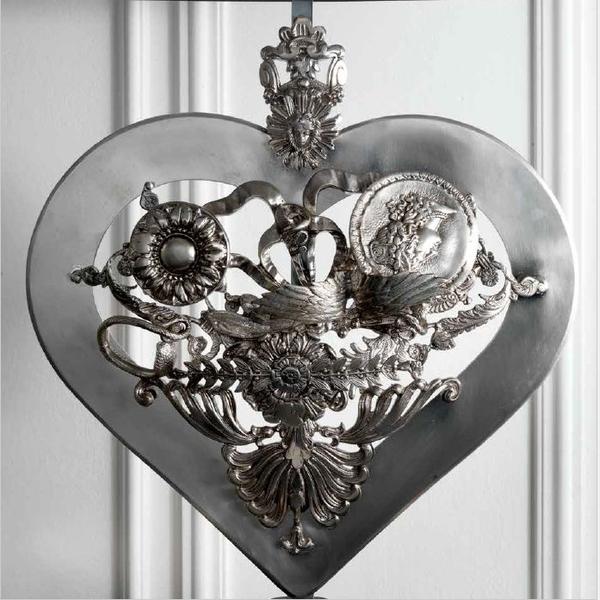 Pretty silver metal table lamp with decorative heart and red shade from Italy