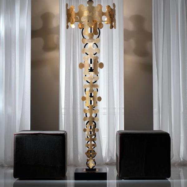 Tall hand-crafted chrome pendant light with jigsaw design from Italy