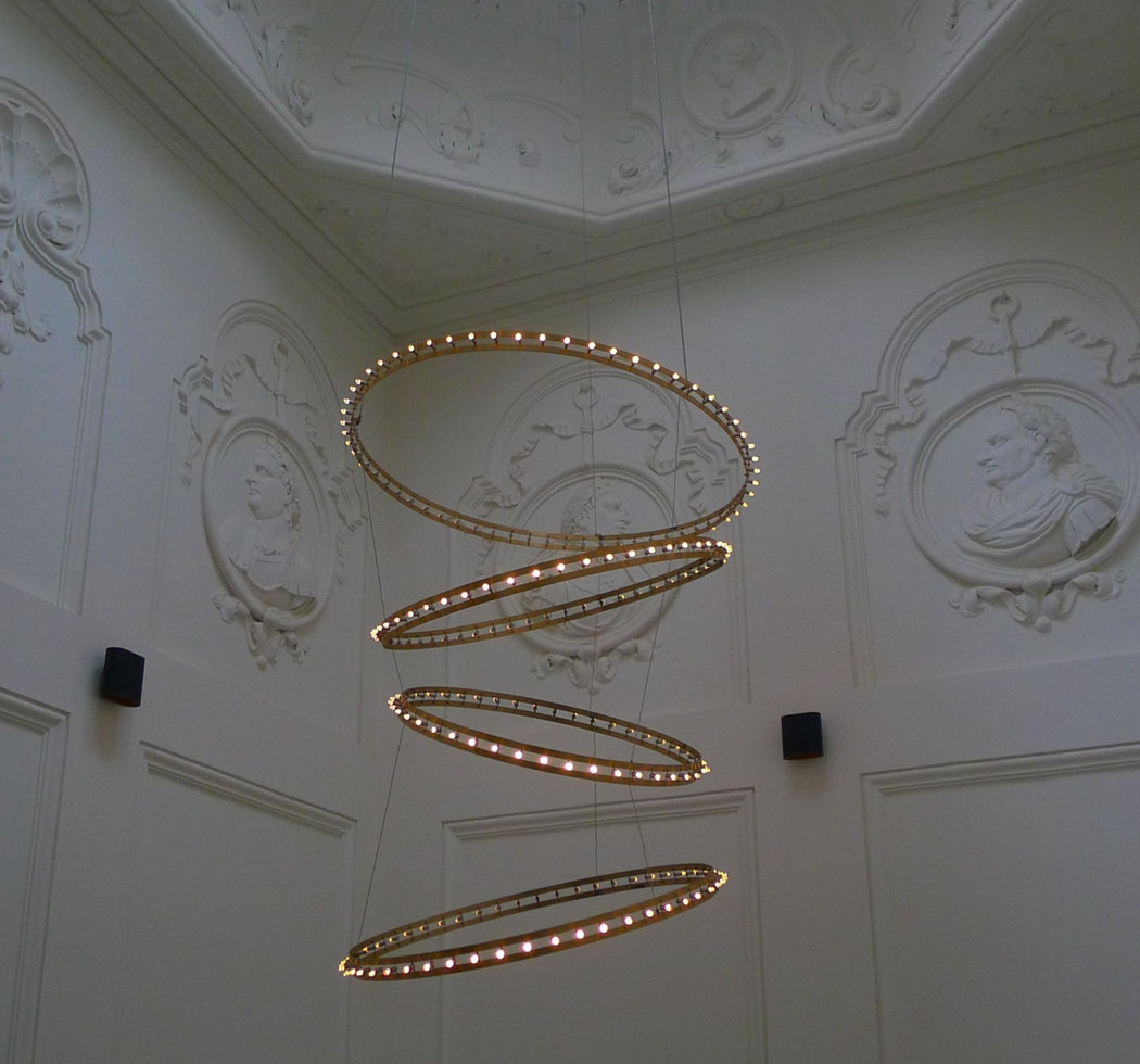 Studded LED ring  pendant for single or modular use in a modern stairwell