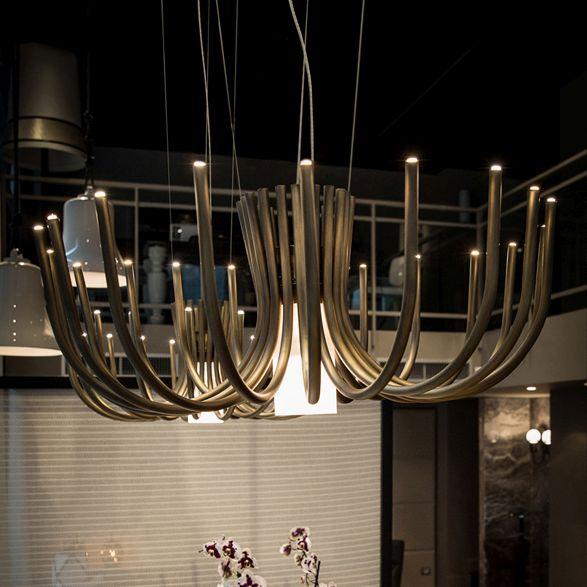 Understated large modern chandelier in black nickel or bronze with white glass diffusers