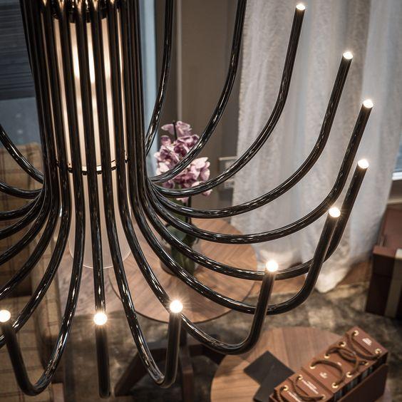 Understated large modern chandelier in black nickel or bronze with white glass diffusers