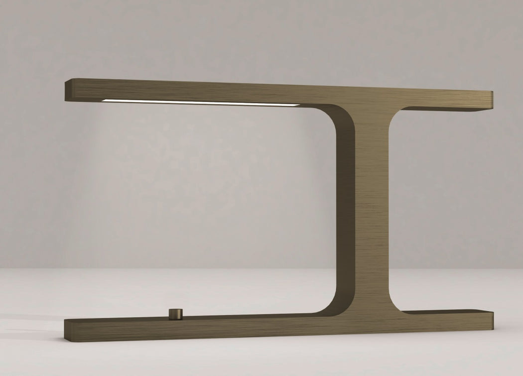 Narrow architectural table light in satin bronze with directional LED illumination