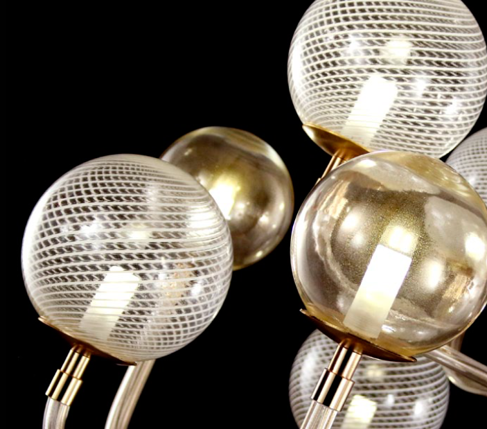 Mid-century inspired chandelier with gold frame & white spheres