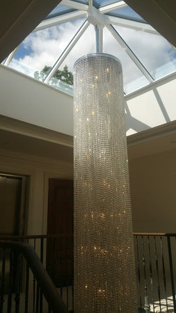 Long Crystal Waterfall Chandelier Installed into a roof light