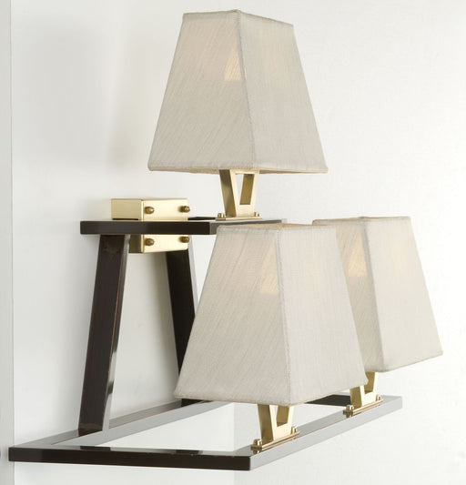 Understated modern Italian brass wall light with gold shades