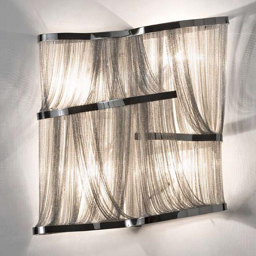 The 'Atlantis' metal chain wall light from Terzani in gold, bronze, nickel or black nickel