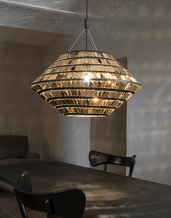 The glamorous Kika modern metal pendant from Terzani  in white, black and gold.