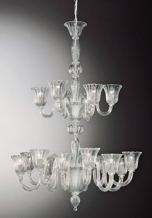 A clear Murano glass chandelier with 18 lights, featuring a two-tier design and intricate glass patterns.