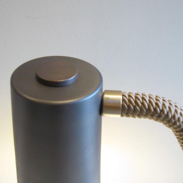 Tall modern bronze or chrome desk lamp with silk rope detail