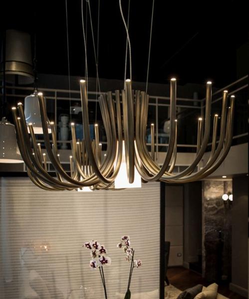 Understated small  modern chandelier in bronze or black metal