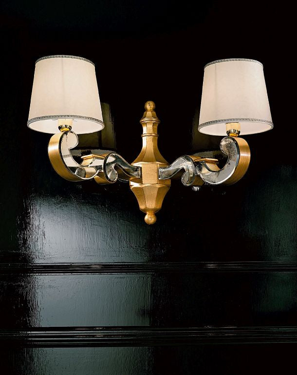 High end golden Venetian wall light with hand-bevelled mirror inserts