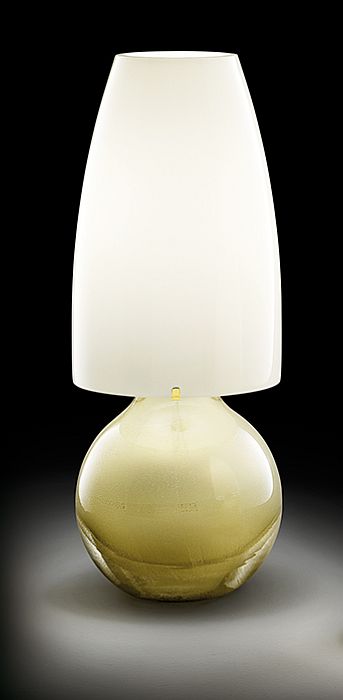 The Argea Murano glass table lamp from Venini with gold or silver finish